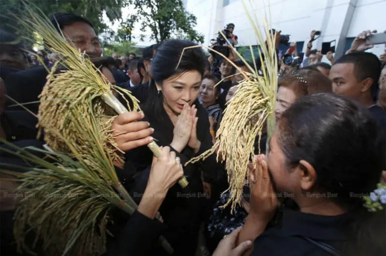 Yingluck muss Milliarden blechen